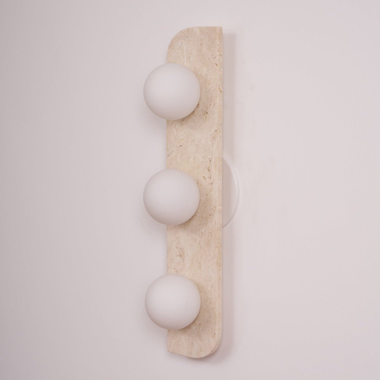 Zophaor Minimalist Travertine Plug-In Wall Light - Blowlighting