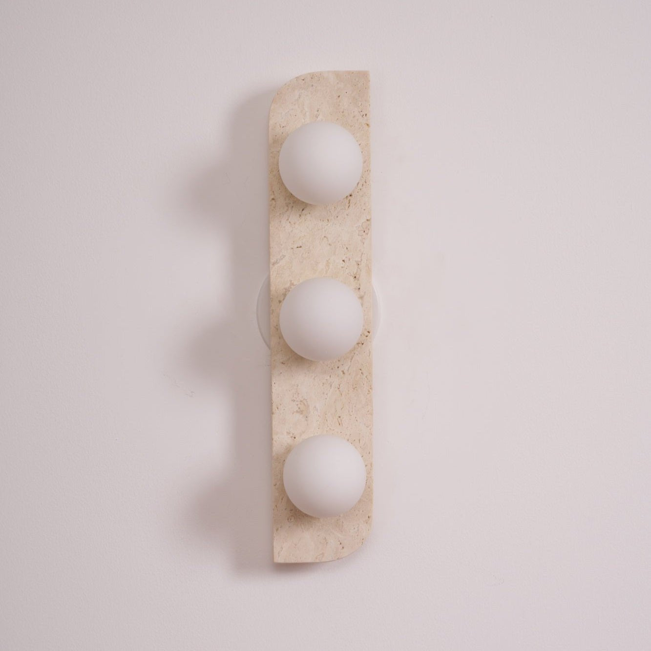 Zophaor Minimalist Travertine Plug-In Wall Light - Blowlighting