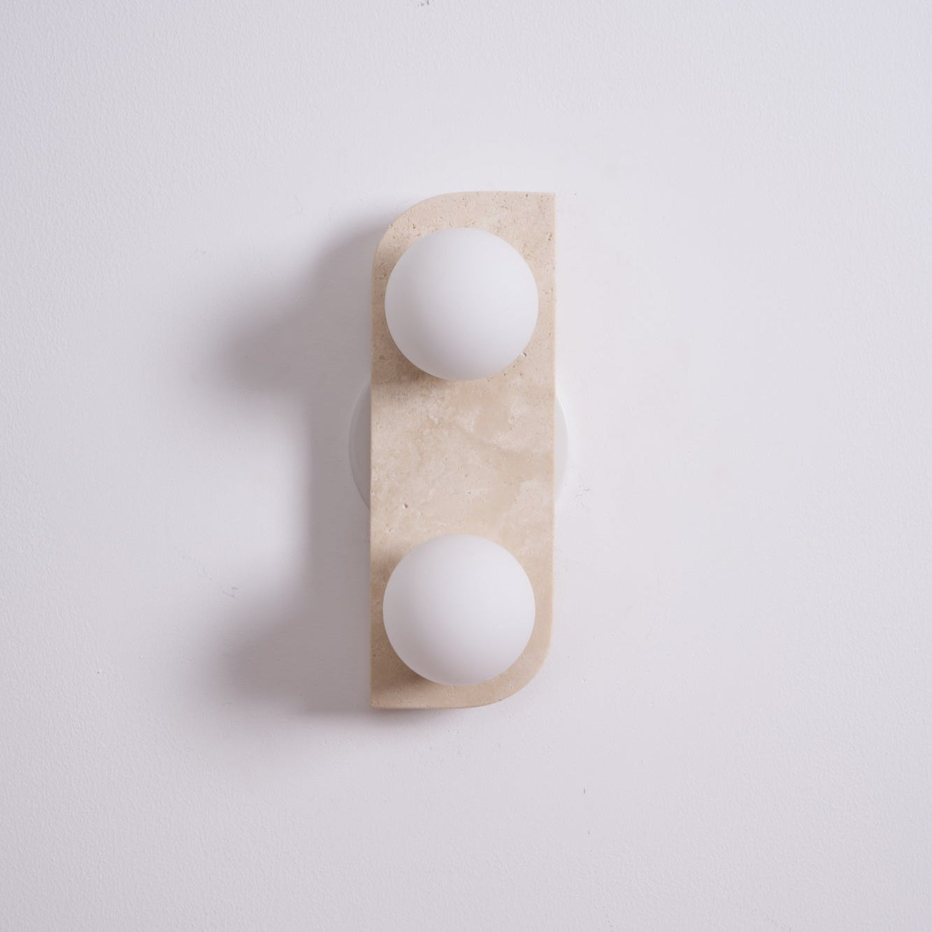 Zophaor Minimalist Travertine Plug-In Wall Light - Blowlighting