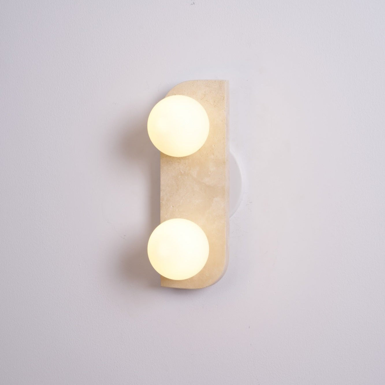 Zophaor Minimalist Travertine Plug-In Wall Light - Blowlighting