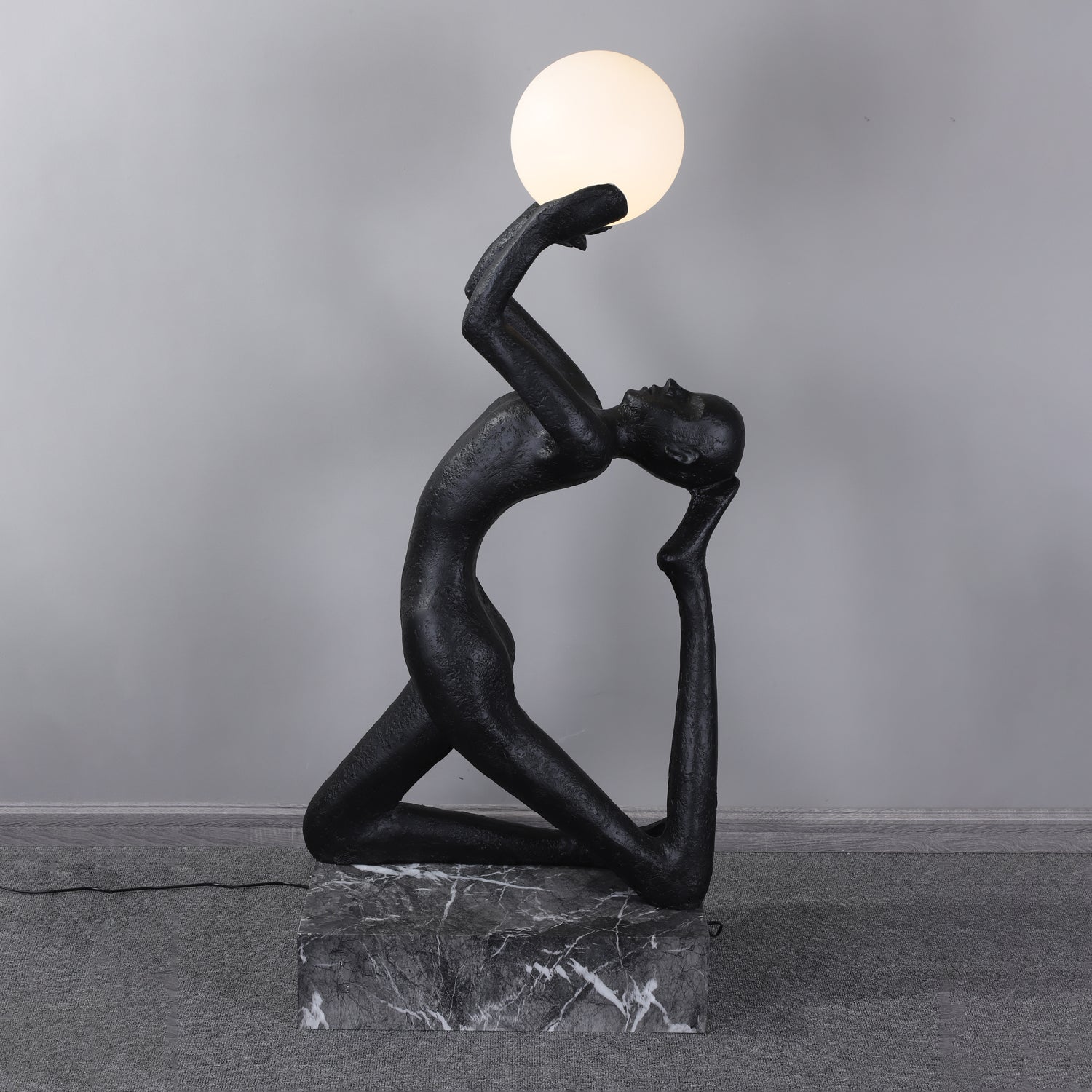 Evvinyra Contorted Black Metal Floor Lamp - Blowlighting
