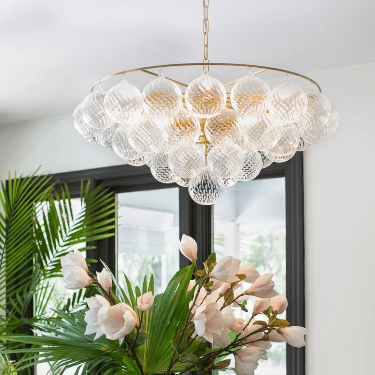 Aurora Chandelier Clear Glass Globe Aged Brass Elegant - Blowlighting