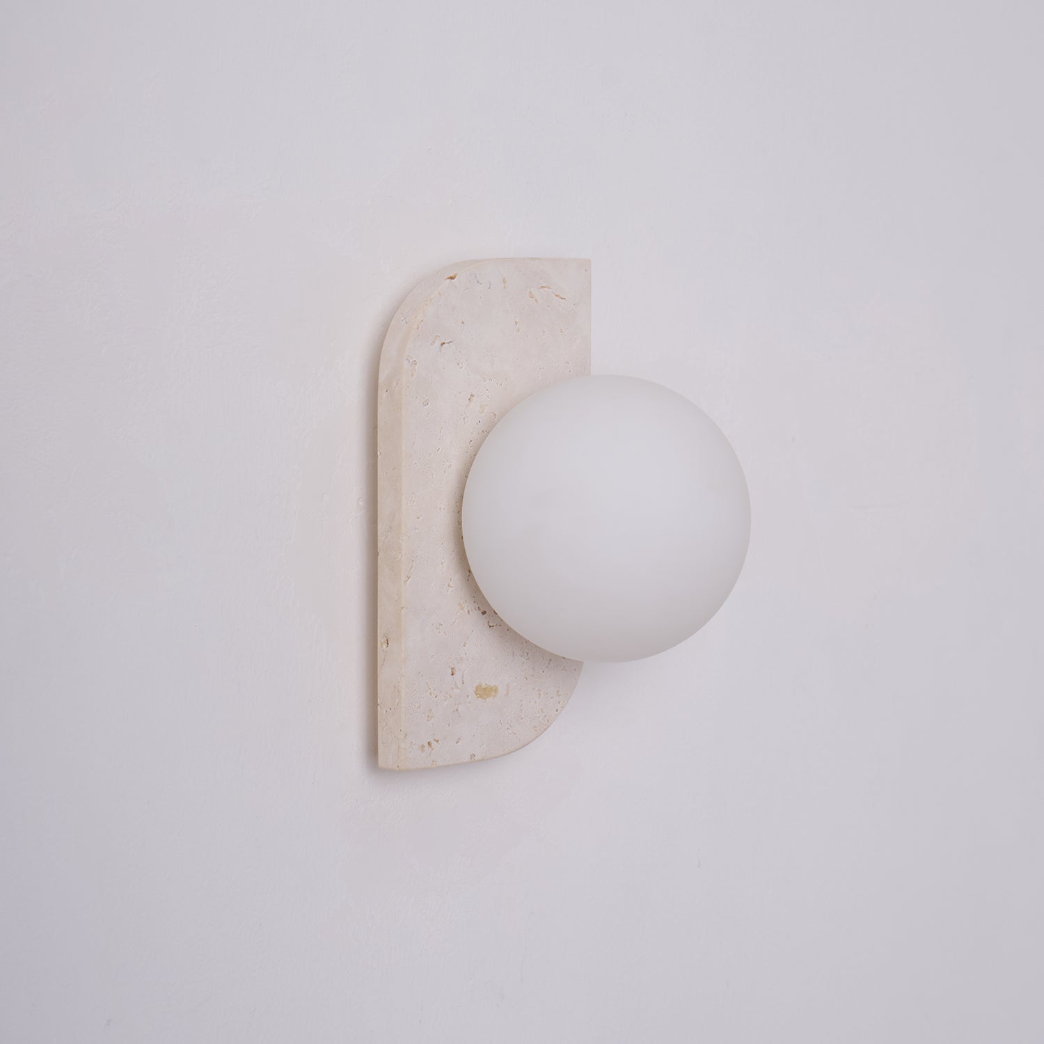 Zophaor Minimalist Travertine Plug-In Wall Light - Blowlighting